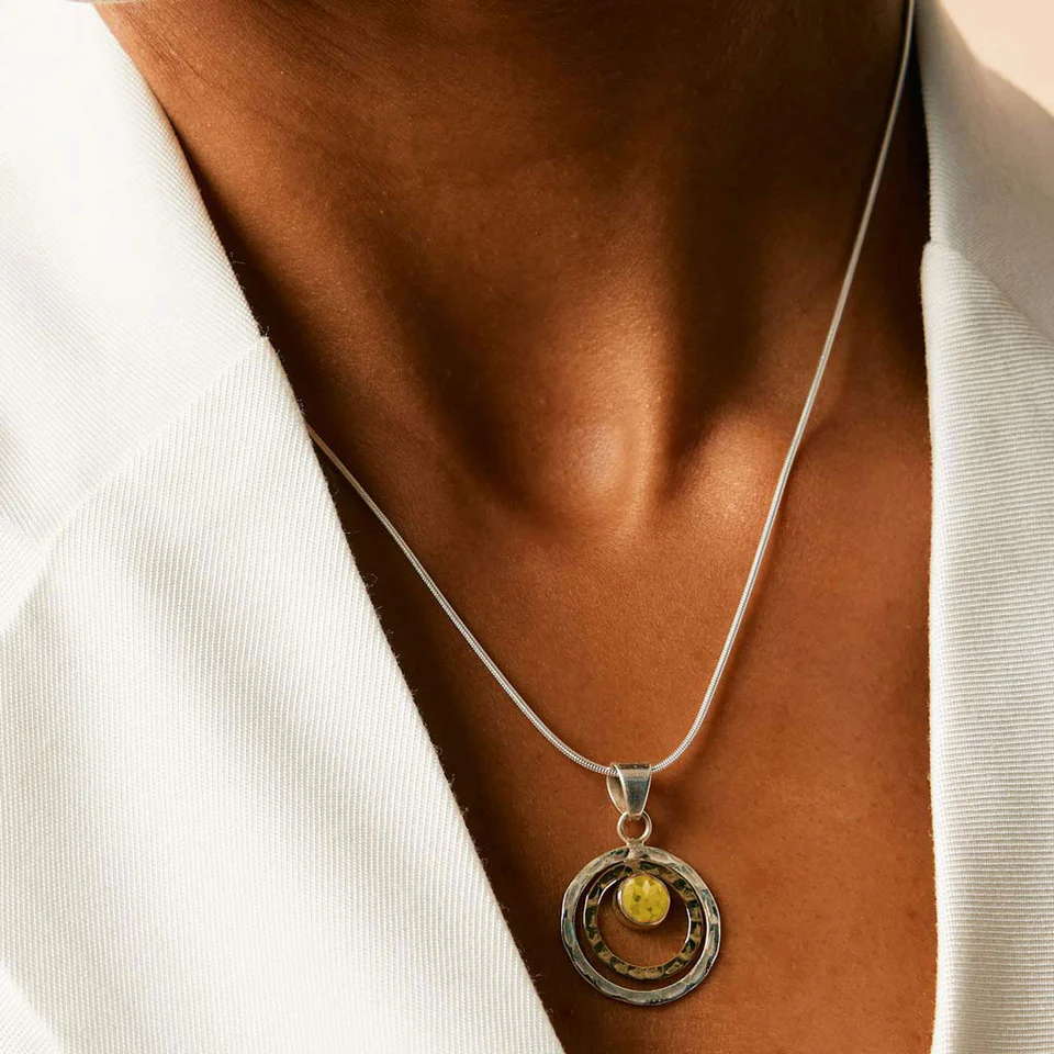 Man wears personalised necklace 